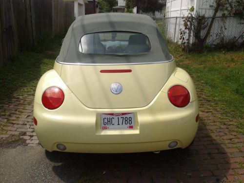 Yellow,convertible in good condition,all options