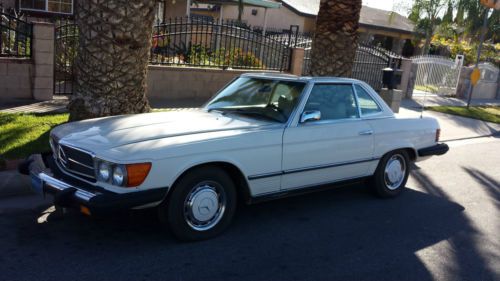 1975 mercedes- benz 450 sl 2- door roadster convertible with soft and hard top.