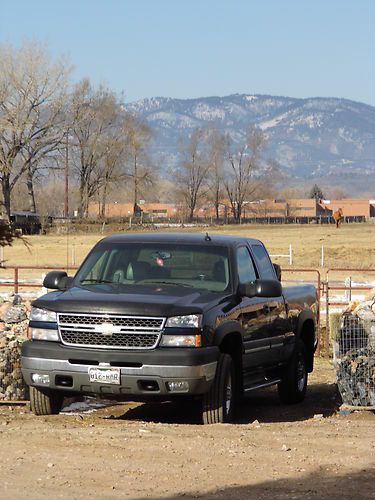 2500 hd; chevy shortbox pickup; 115,100 miles; blue; minor dings