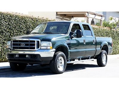 Crew cab short bed srw 7.3l powerstroke diesel lariat 59k miles .. mint!!