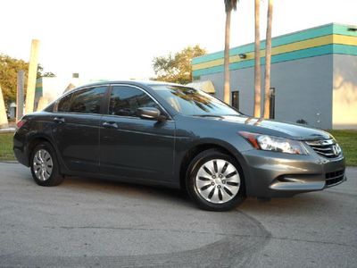 Lx sedan automatic 13k miles like new fl. rebuilt title