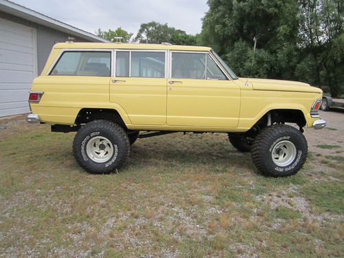 73 jeep wagoneer- great truck, great resto.