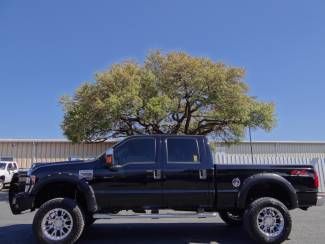 Lifted black lariat super duty crew back up camera we finance we want your trade