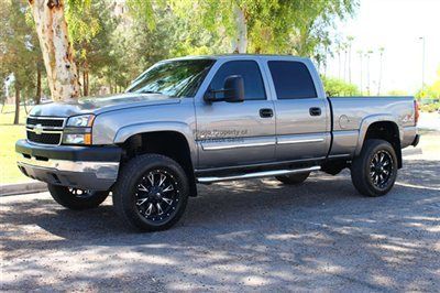 Duramax diesel 4x4 with 20 inch black fuel wheels spray in bedliner - we finance