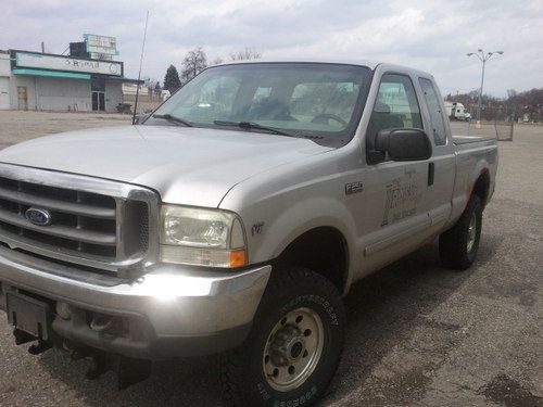 2002 ford f250 w/ 8' boss plow truck is a beast work truck plow only few years