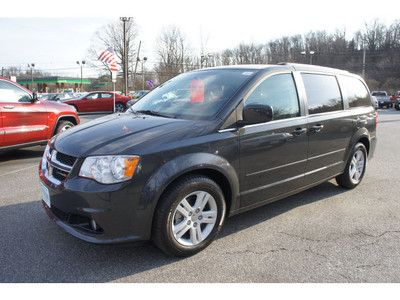 Low miles, dvd system, stow and go seating, clean car fax one owner