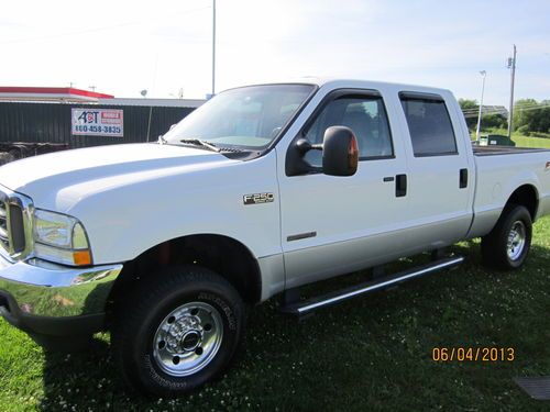 2004 ford f250 crew sht bed 4x4 1owner super nice truck no disapointments