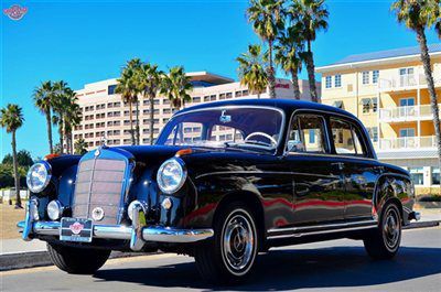 '58 220 s sedan. black/red, superb example