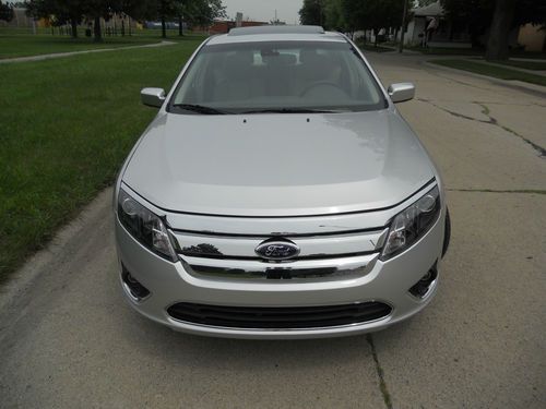 2012 ford fusion sel 2.5l*no reserve*blidspot*spoiler*camera*sync*htd*rebuilt