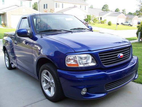 2004 ford svt lightning, sonic blue w/ 55,100 miles. very well maintained