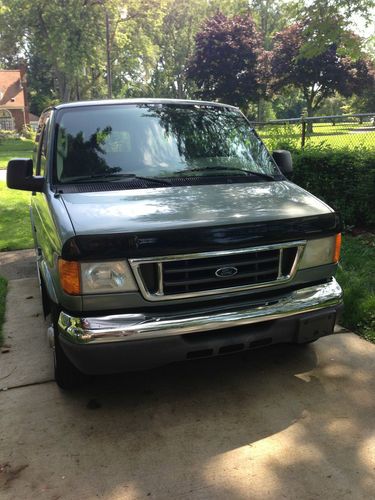 2006 ford 12 passenger van, light green exterior, tan cloth seats