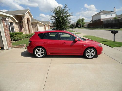 Sporty red 2004 mazda 3 clean, dependable gas saver. great work or school car.