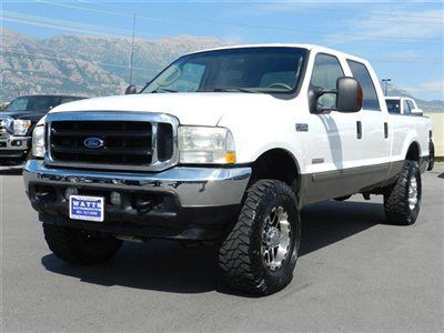 Ford crew cab powerstroke diesel 4x4 lariat custom level tires wheels leather