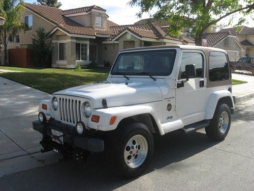 1998 jeep wrangler sahara sport utility 2-door 4.0l with sno-way plow