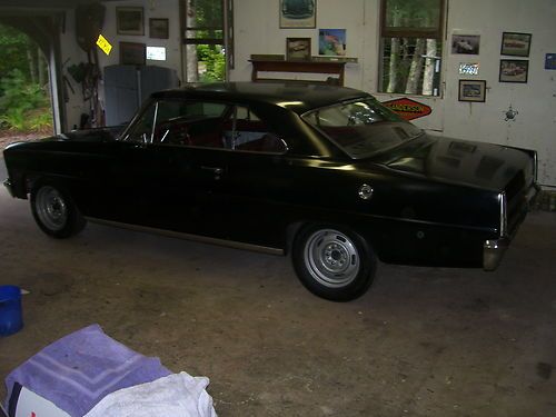 1966 chevy nova ,base black with red interior ,327 ci, motor , turbo 350 trans.