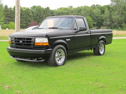 94 f150 lightning flat black, nice truck gt40 351 engine runs good! no reserve!!