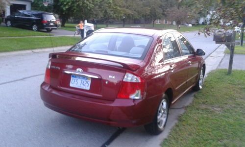 2005 red spectra kia ex 59,000 miles excellent on gas toledo ohio runs perfect