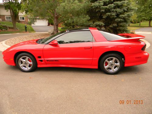 1999 pontiac trans am - manual 6 speeed, red, and w/t-tops