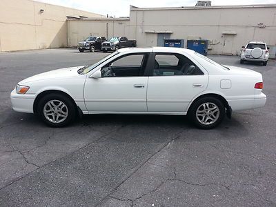 Low reserve_automatic_extra clean_v6_ice cold a/c_power options_sunroof_alloys__