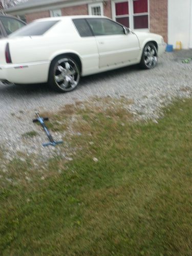 Pearl white cadillac eldorado