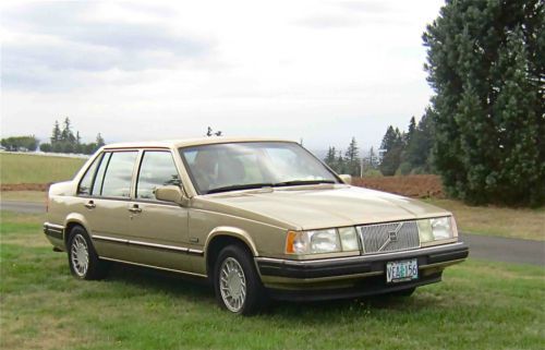 Gold sedan, sunroof, leather refurbished