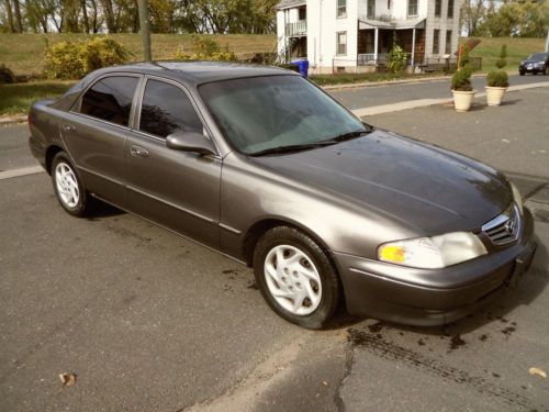 2001 mazda 626 lx 4-door 2.5l v6 needs internal engine work, will run or parts!