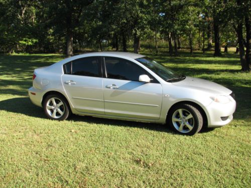 2006 silver mazda 3i compact car