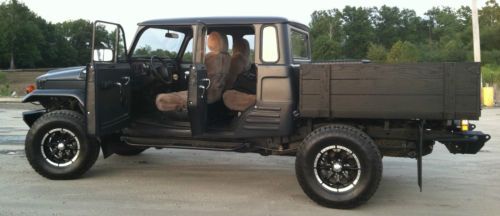 Custom 67&#039; land cruiser troop carrier body on 06&#039; tacoma 6spd chassis