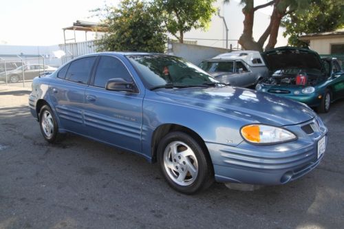 1999 pontiac grand am se sedan automaic 6 cylinder no reserve