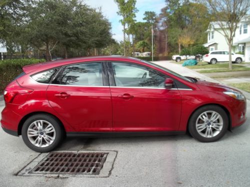 Like new only 8200 miles  sel hatchback red