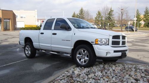 2004 dodge ram slt quad cab 4 door 20 inch wheels, infiniti sound, no reserve.