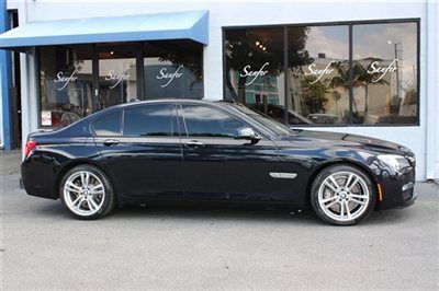2010 bmw 750i m sport,black/tan,camera pack,long terms available,trades accepted