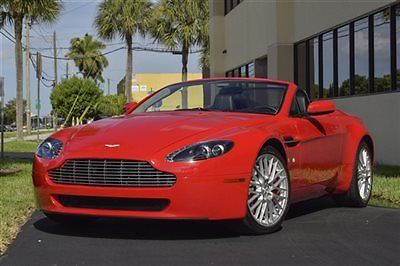 &#039;09 aston martin convertible,spc. order ferrari red,prem audio,navi, 2,300 miles