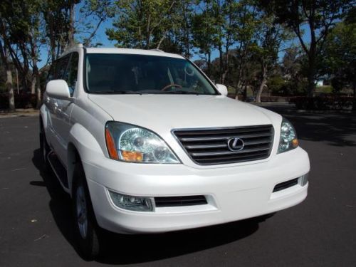 Gx470 pearl white, 3rd row, clean, 4wd, loaded, financing available