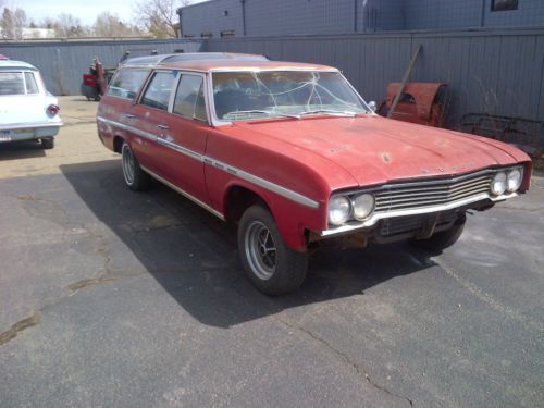 Two 1965 buick skylark sport wagons
