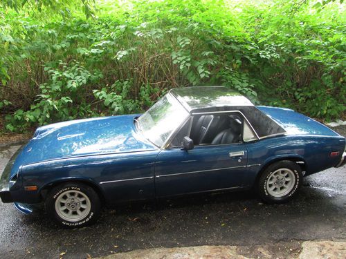 Mgb?? triumph ?? moped??? nope....it's a  jensen healey  1975