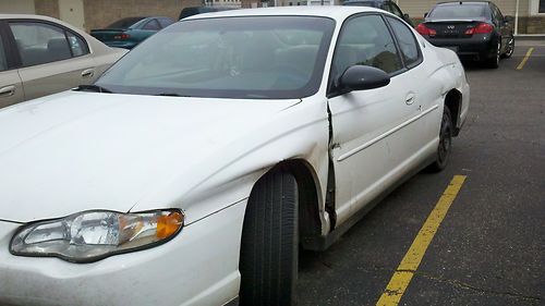 2000 chevy monte carlo 258,951 miles have key starts n runs  body damage