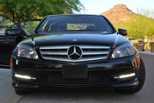 2011 mercedes c300 luxury sedan,black on black,with 25150 miles