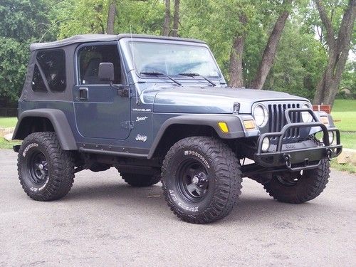 2002 jeep wrangler sport , custom lift, 33x12.5 tires, super clean , must see