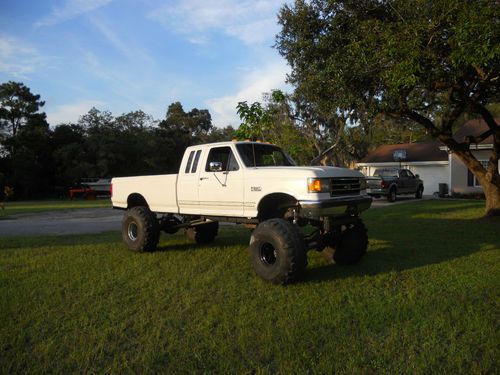 Lifted ford f-250 on 44 in. super swampers