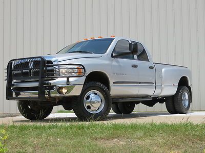 04 ram 3500 (slt) leather 5.9 cummins h.o 6spd exhaust bfgs 4wd carafx sharp  tx