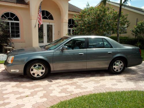 2003 deville sedan mint condition -see videos click below