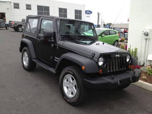 2011 jeep wrangler, sport, very low low miles,balance of warranty