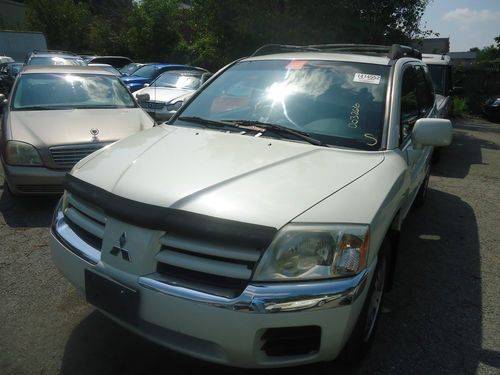 2005 mitsubishi endeavor 4x4 runs good has couple of dent can drive it home