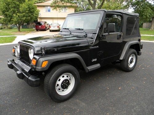 1998 jeep wrangler / automatic transmission / ice cold a/c / hard doors / cruise