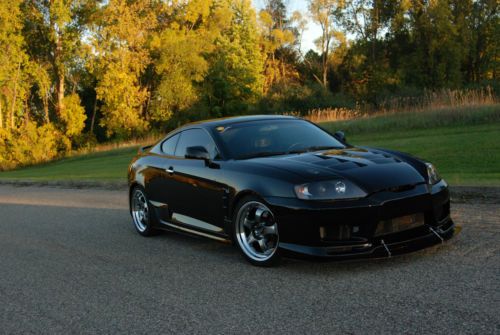 Beautifully modified black 2003 hyundai tiburon