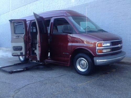 Handicap mobilty hi top conversion van under vehicle lift