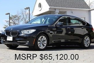 Black sapphire metallic auto awd only 6,478 miles like new premium pkg perfect