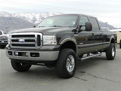 Ford crew cab lariat 4x4 powerstroke diesel custom lift wheels tires leather