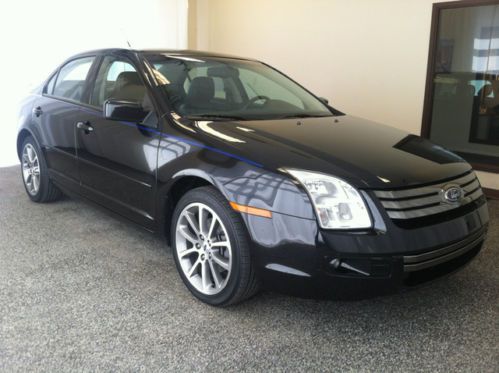 Black 4 door sedan black and red leather interior sunroof carfax two owners